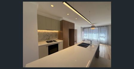 RENOVATED AND LIGHT FILLED! - Photo 4