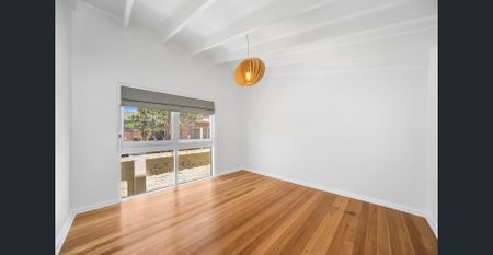 Beautifully Renovated Four-Bedroom Home with Spacious Outdoor Living - Photo 3