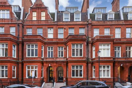 A penthouse bedroom apartment in a recently refurbished building benefitting from a generous terrace off of the reception room, lift access and wooden flooring throughout. - Photo 3