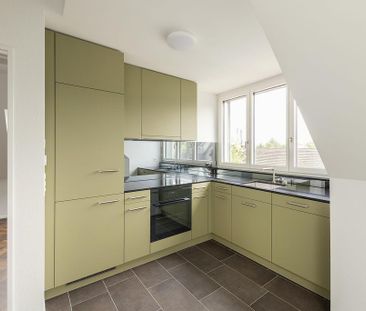Hübsche Dachwohnung mit Quartiercharakter - Photo 1