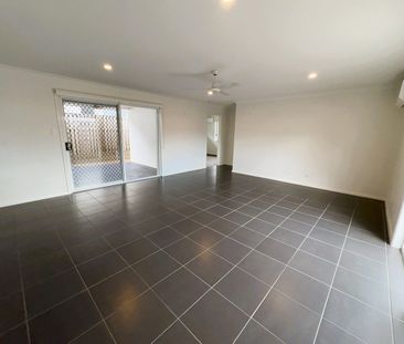 BREAK LEASE - Modern 4-Bedroom Home in Sought-After Gainsborough Gr... - Photo 2