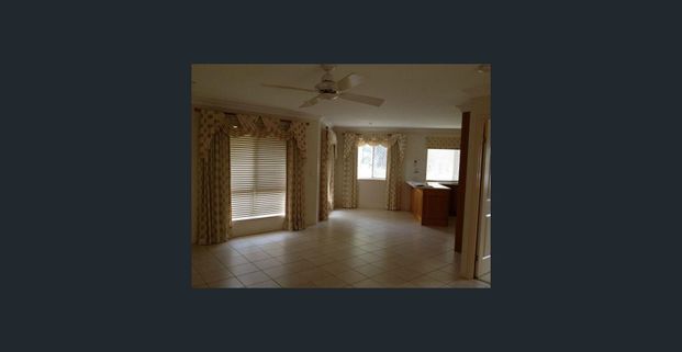 SPACIOUS LOWSET BRICK HOME WITH AIR CON - Photo 1