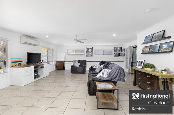 Modern Lowset Family Home with Side Access + Large Shed - Photo 1