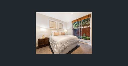 Spacious Two-Bedroom Apartment with Courtyard in a Quiet Complex - Photo 3