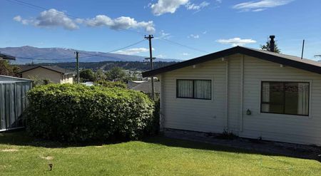 Spacious Family Home with Versatile Living Options - Photo 4