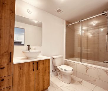 Shop Angus: condo 2 chambres, construit en 2024, offert en location... - Photo 1