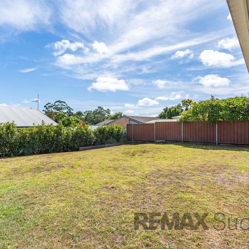Versatile Spacious Family Home with Multiple Living Areas in Centenary Heights - Photo 1