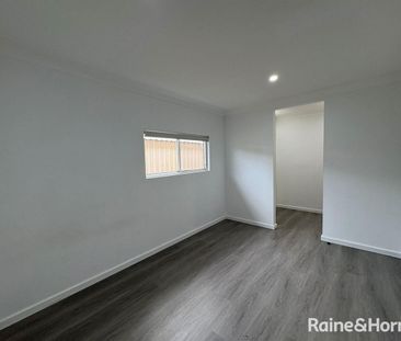 Charming Minto Family Home with Sparkling Swimming Pool - Photo 4