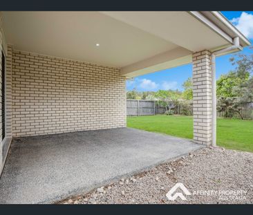 ✨ Modern Family Comfort Backing onto Peaceful Parklands ✨ - Photo 4