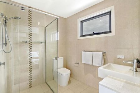 Sophisticated Three-Level Townhouse in a Sought-After Pocket - Photo 2