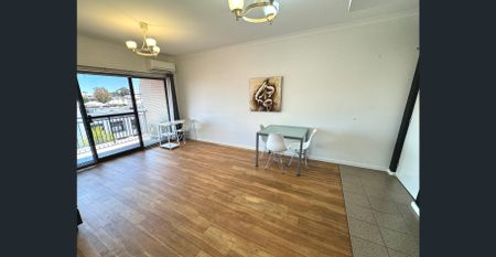 Partly Furnished Top Floor Apartment - Photo 3