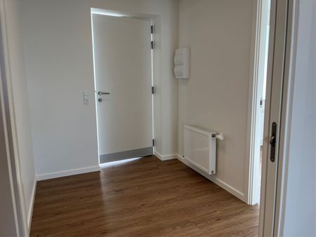 Nyopført med egen p-plads i kælder og elevator direkte til lejligheden - Photo 4