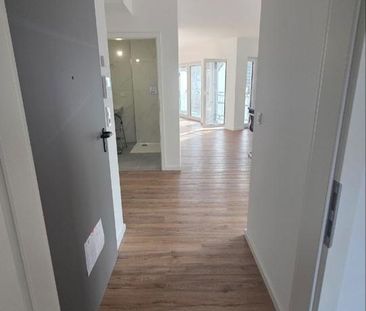 Neubauwohnung (Erstbezug) mit 2 Zimmern und Tiefgaragenstellplatz i... - Photo 1