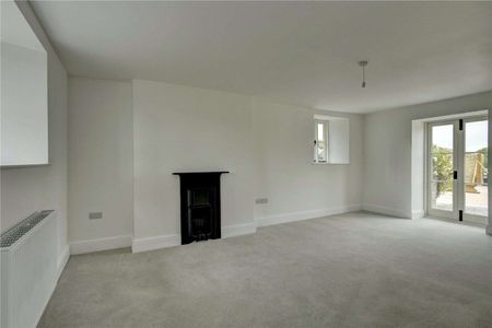 A very well presented and newly refurbished four bedroom farmhouse with solar panels situated in a rural position and accessed by a private driveway. - Photo 2