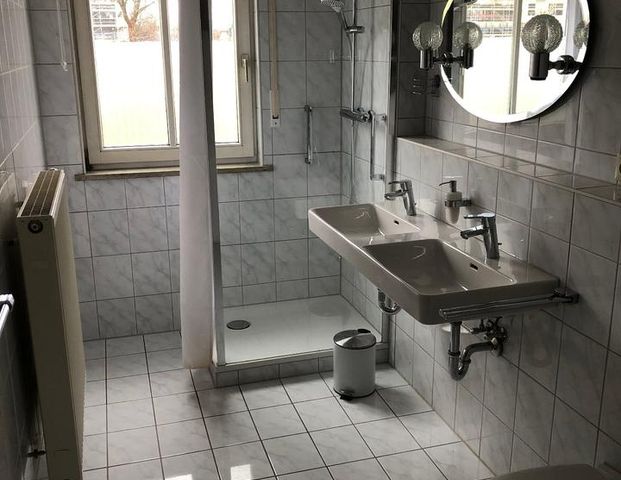 Gut geschnittene helle 3-Zimmer-Wohnung im EG mit Garten und EBK - Foto 1