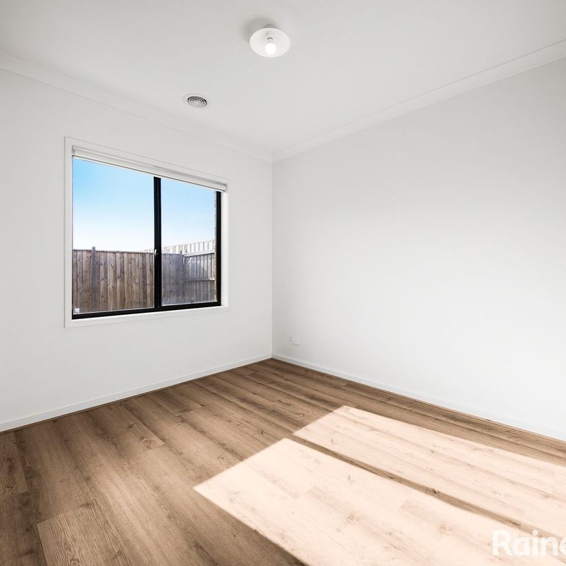 BRIGHT NEAR NEW 4 BEDROOM HOME - Photo 1