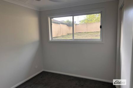 BRAND NEW PRIVATE GRANNY FLAT with yard maintenance and water included! - Photo 3