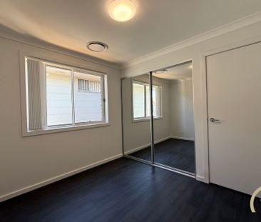 Brand New 4 Bedroom Home, Located in Austral! - Photo 3