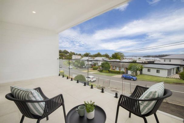 Luxurious New 4-Bedroom Townhouse with Water Views, Private Lift & Premium Features - Photo 1