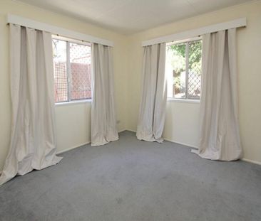 Deceptively Spacious Family Home with Multiple Living Areas - Photo 4