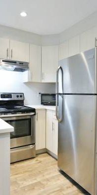 MODERN and very spacious 2 bedroom suite - utilities included! - Photo 1