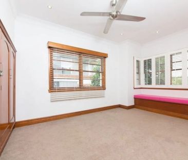 Elegant Stucco Double Brick Home with Character and Modern Comfort - Photo 3