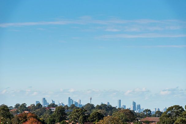 Exquisite Two Bed Plus Study Apartment with City Views and Two Parking - Photo 1