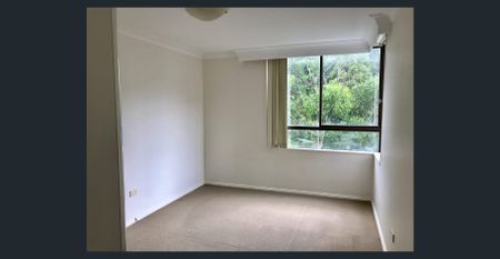 TRANQUIL 2 BEDROOM APARTMENT WITH SECURE PARKING AND DISTRICT VIEWS - Photo 2