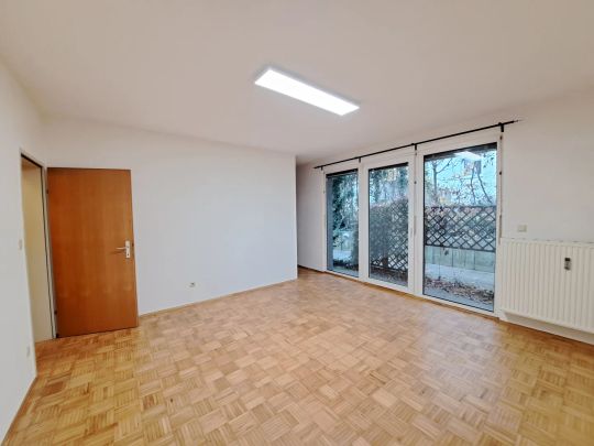 Kleinwohnung in ausgezeichneter Lage direkt an der Mur | Schwimmschulkai 96 Top 1 - Photo 1