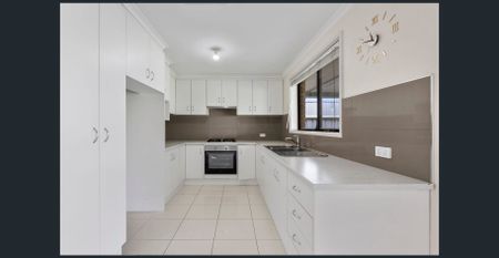 Ideal Low Maintenance Family Home PLUS Solar! - Photo 4