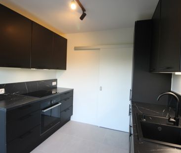 Gerenoveerd 2-slaapkamerappartement met terras en garage. - Foto 6