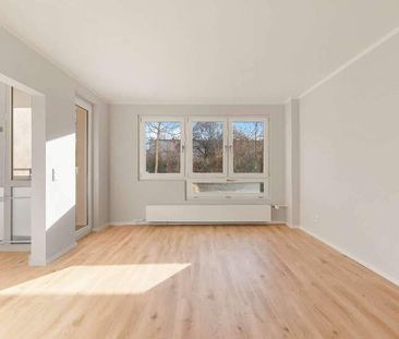 Exklusiv saniert! 1-Zimmer-Apartement mit Einbauküche & Balkon in T... - Photo 1