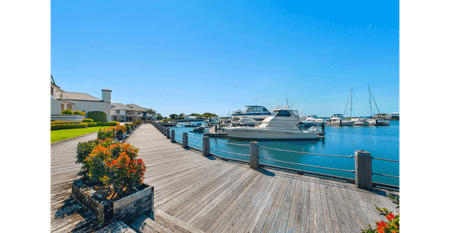 SPACIOUS WATERFRONT VILLA IN PRESTIGIOUS CALYPSO BAY - LUXURY LIVING WITH MARINA VIEWS - Photo 3