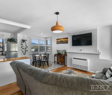 Renovated Family Home with Modern Finishes & Secure Yard - Photo 1