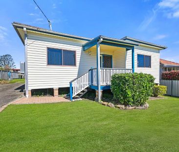 FAMILY LIVING IN THE HEART OF TOWN - Photo 1