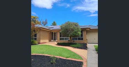 Spacious 4-Bedroom Home with Multiple Living Areas - Photo 5