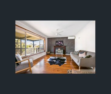 THIS BEAUTIFUL THREE BEDROOM FAMILY HOME - Photo 1