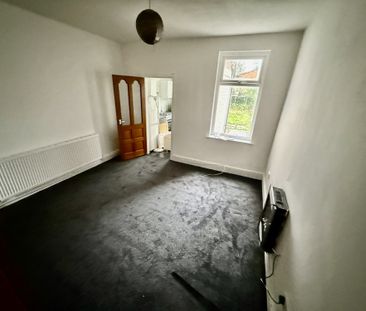 A mid terraced property consists of living room with separate dinin... - Photo 1