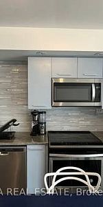 Feels brand new entertainment district + den parking included! - Photo 4