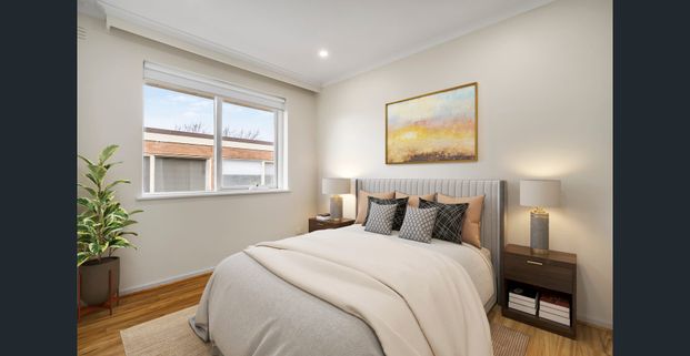 Spacious Three-Bedroom Apartment in a Prime Location - Photo 1