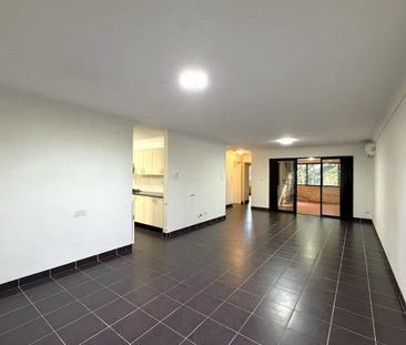 ELEVATED UNIT IN A CENTRAL LOCATION - Photo 1