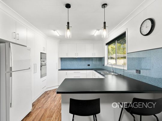 COMFORTABLE THREE-BEDROOM HOME WITH MODERN FEATURES - Photo 1