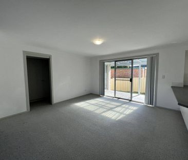 Charming Two-Bedroom Unit for Rent - Photo 3