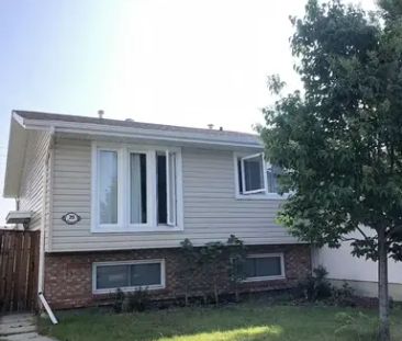 Bright and Spacious Main Level Bungalow in Deer Run | Calgary - Photo 1