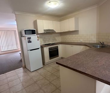 LOW MAINTENANCE & FULLY FURNISHED UNIT! - Photo 6