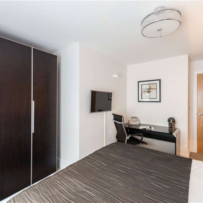 Ground floor two bedroom, two bathroom flat with a private terrace leading to communal gardens - Photo 1