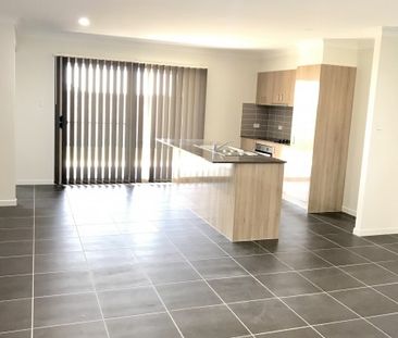 NEARLY BRAND NEW! SPACIOUS & MODERN - Photo 5
