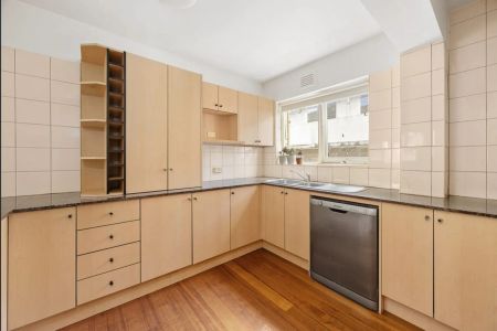 Lifestyle Living! Sunlit Two-Bedroom Apartment with Secure Parking - Photo 4