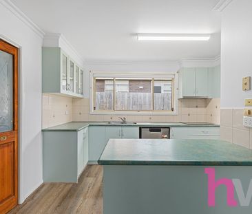 Neat 4 Bedroom Home - Photo 1