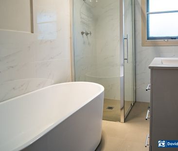 Immaculate 4-Bedroom Home with Premium Kitchen & Large Backyard - Photo 5